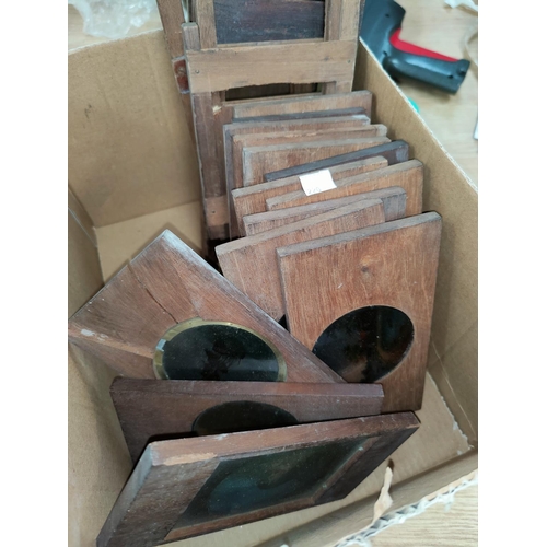 220 - 14 Magic Lantern slides in wooden frames and other frames.