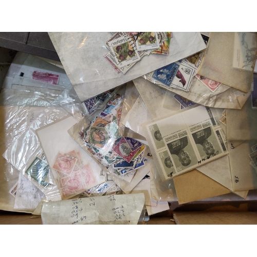 728 - A selection of packets of stamps