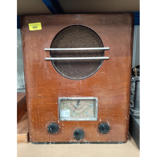 493 - A 1930's walnut framed ULTRA mains radio (knob missing)