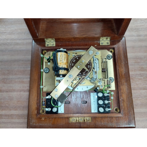 499 - A mahogany cased clock mechanism possibly for a factory clock