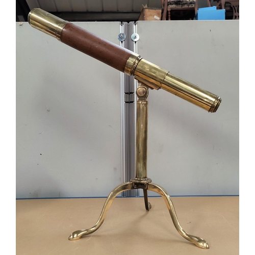 514A - A reproduction brass table top telescope on tripod base