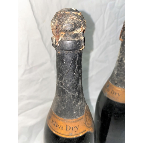 517 - Two vintage champagnes, corks a.f, levels low, no labels