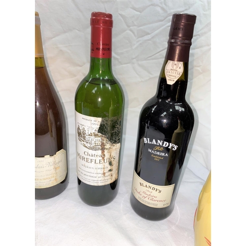 524 - 5 bottles of wine including Chateau Mirefleurs 1994, Nero d'Avola 2013, Cote du Rhone Villages 2003 ... 