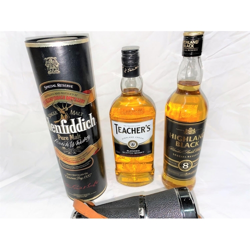 525 - A bottle of Glenfiddich single malt whisky, a bottle of Highland Black; a bottle of Teachers whisky;... 