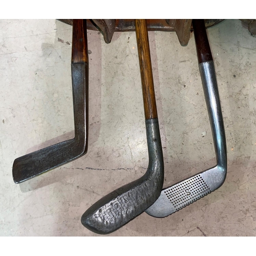 541 - Two early 20th century golf clubs 'Braid Mills Medium Lie' and another by James Braid, a Ben Squires... 