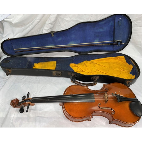 545 - A mid 20th century violin with 2 piece back, length of body 35.5cm with bow and hard case