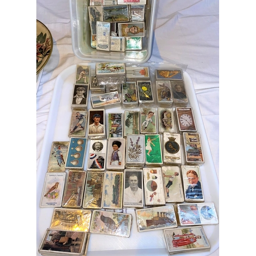 802 - A large quantity of cigarette cards bagged in part sets