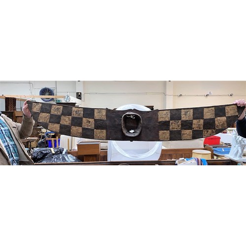 184 - An East African tribal carved wood hawk mask, Bwa shallow carved geometric decoration painted in ear... 