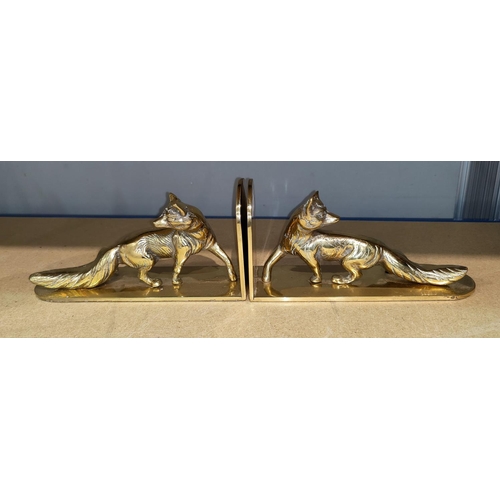 14 - A pair of brass fox bookends