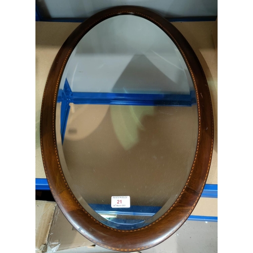21 - An Edwardian wall mirror in inlaid mahogany oval frame; ornaments; bric-a-brac