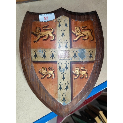 52 - A hand painted shield with Cambridge University coat of arms:  gules on cross ermine between 4 lions... 
