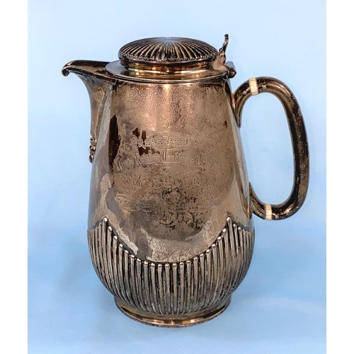 298 - A hallmarked silver baluster coffee pot with ribbed decoration with presentation inscription and reg... 