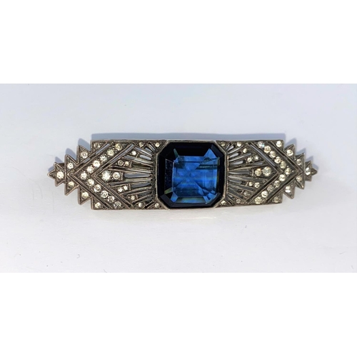 371 - A vintage white metal Art Deco brooch with large blue sapphire colour stone  & white spinels, stampe... 