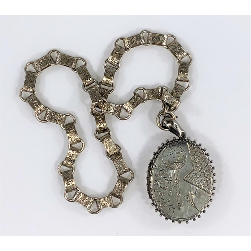 373 - A Victorian oval white metal locket on collarette chain tested silver, locket hallmarked Birmingham ... 