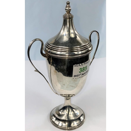 385 - A hallmarked silver covered trophy cup with 2 handles, inscribed, London 1932, 5 oz