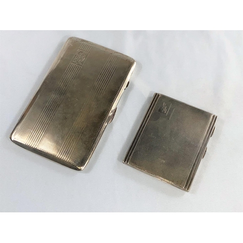 391 - Two hallmarked silver engine turned cigarette cases, Birmingham 1937 & 1943, 8.5 oz