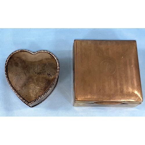 301 - A hallmarked silver heart shaped trinket box, inscribed, Birmingham 1909, 2.5oz; a monogram engine t... 