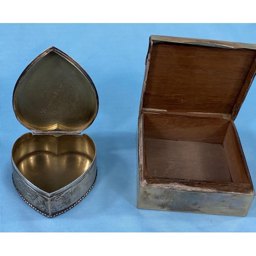 301 - A hallmarked silver heart shaped trinket box, inscribed, Birmingham 1909, 2.5oz; a monogram engine t... 