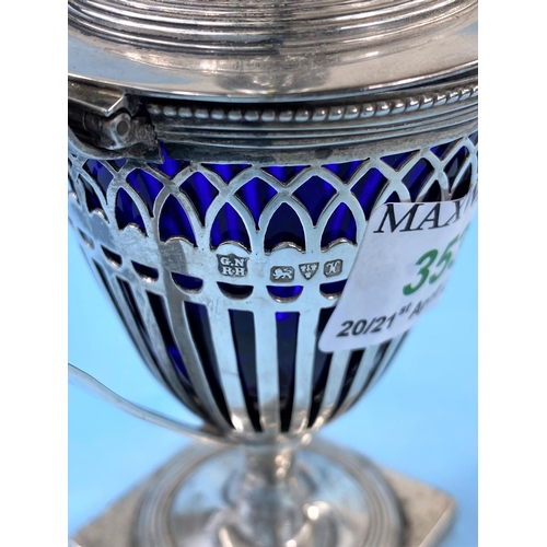 353 - A hallmarked silver mustard pot, classical pierced style, Chester 1900 (base dented)