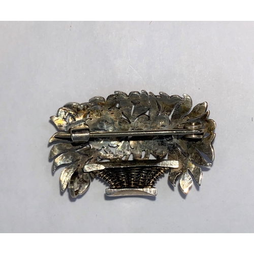 377 - A silver and gold wire floral basket brooch set approximately 80 rose cut diamonds, c 1900, 5 gm