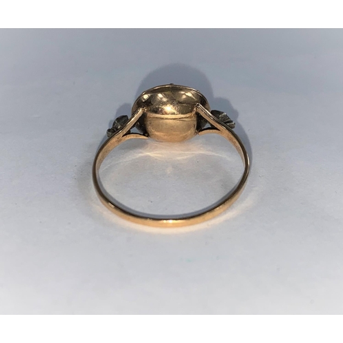 383 - A late Georgian gold dress ring set single oval cut and foiled back stone, with single seed pearl to... 