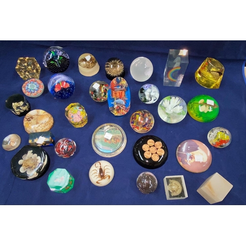 215 - A collection of glass and other paperweights