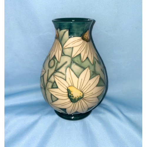 222 - A Moorcroft baluster vase decorated with white star shaped flowers, impressed and monogrammed, secon... 