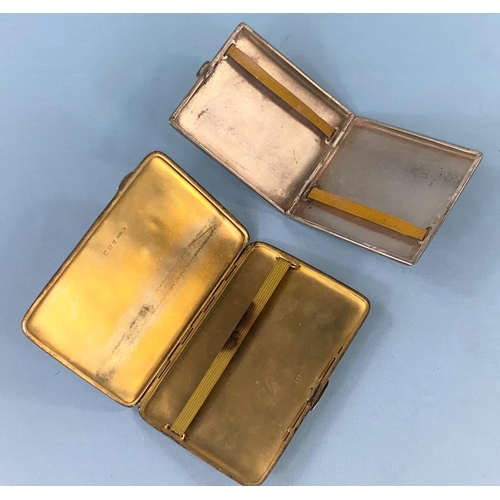 325 - A Hall marked silver engine turned cigarette case and another similar white metal case
1. A few mino... 