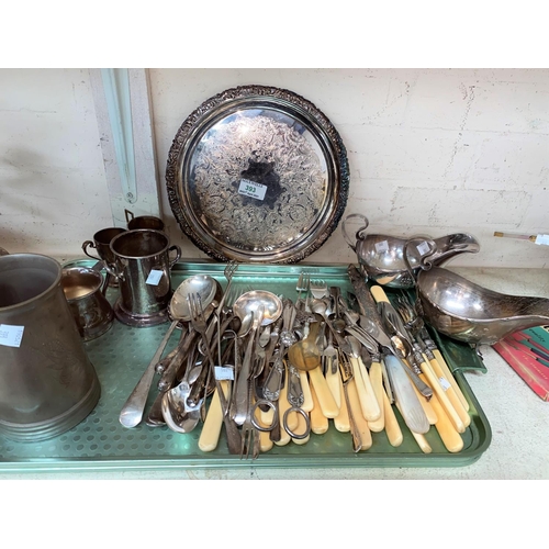 393 - An ornate fish service; silver plate and cutlery