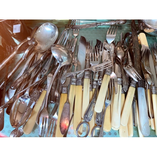 393 - An ornate fish service; silver plate and cutlery