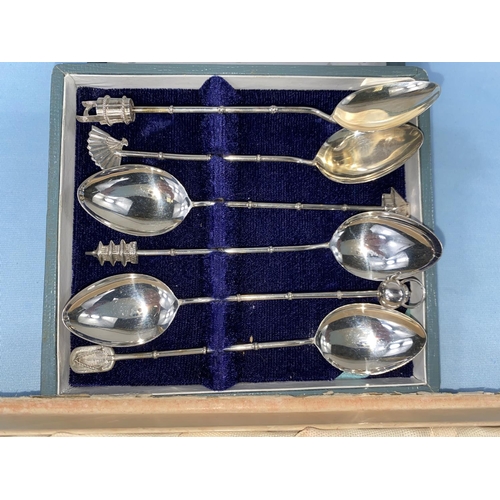 406 - A cased set of 6 Oriental white metal teaspoons with various different finials and a cased set of 6 ... 