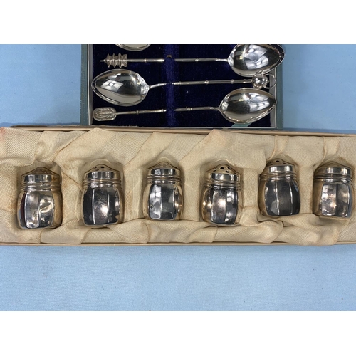 406 - A cased set of 6 Oriental white metal teaspoons with various different finials and a cased set of 6 ... 