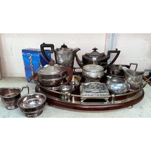 449A - An oval mahogany tray with EPNS gallery; 2 E.P. tea sets and other silver plate.
