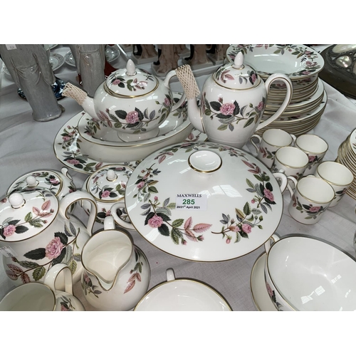 285 - A Hathaway Rose dinner and tea service by Wedgwood