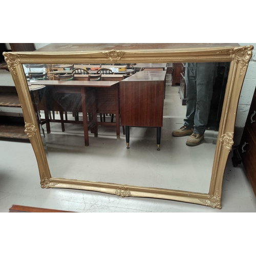 110 - A large wall mirror in rectangular gilt frame