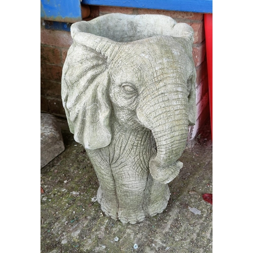 16 - A reconstituted stone garden urn in the form of an elephant's head