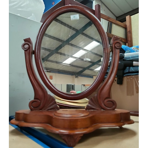 26 - A Victorian oval dressing table mirror in free standing frame (1 hinge replaced); a wall mirror in f... 