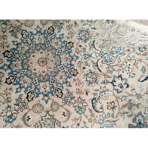 496 - A 20th century hand knotted fawn ground middle eastern carpet 180cm x 109cm