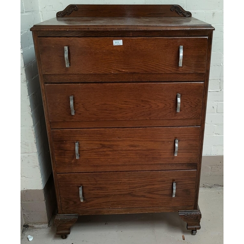 513 - A 1930's oak 4 height chest of drawers