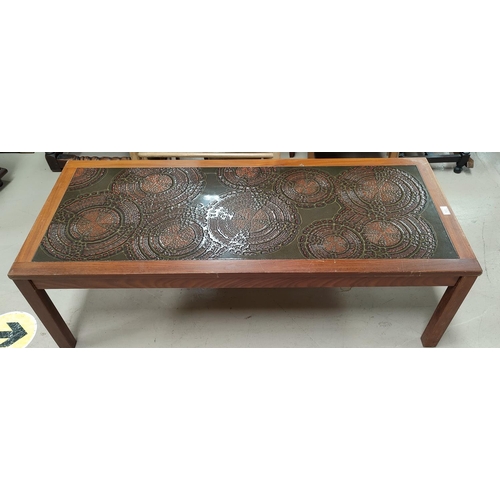 522 - A 1960's rectangular coffee table with walnut framed ceramic top in the style of Poole