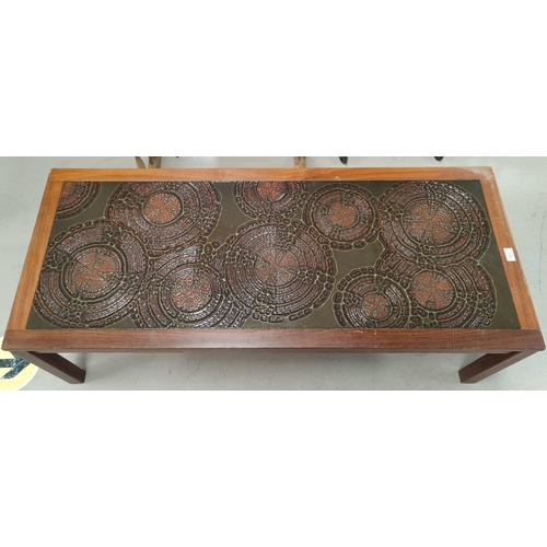 522 - A 1960's rectangular coffee table with walnut framed ceramic top in the style of Poole