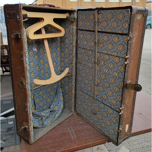 63 - A mid 20th century travelling trunk