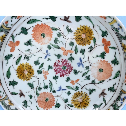 186 - A Chinese Kangxi period dish decorated with various flowers, with border to the edge 27cm in diamete... 