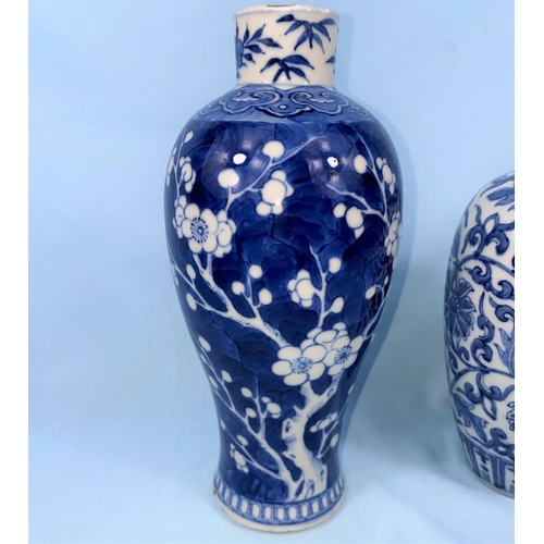 191 - A Chinese blue and white baluster vase, decorated with prunus blossom, with 6 character mark to base... 