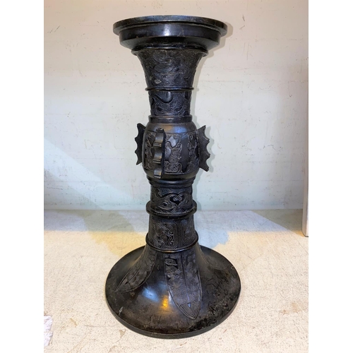 156 - A Chinese bronze vase with wide flared rim decoration in relief, height 42cm (no base)
