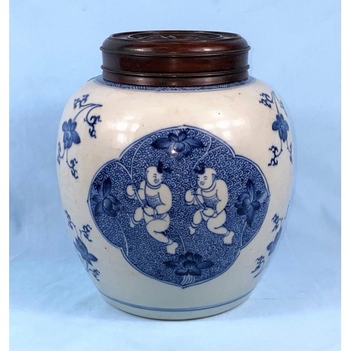 179 - A large Chinese blue and white ginger jar with carved and pierced wooden lid, the body of the jar ha... 