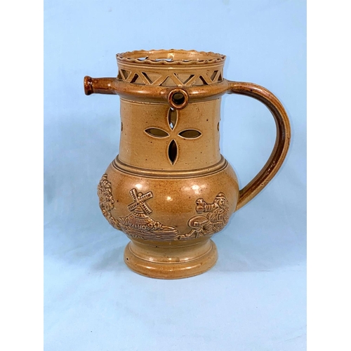 207 - A 19th century English stoneware salt glaze puzzle jug, raised decoration of traditional figures 20c... 