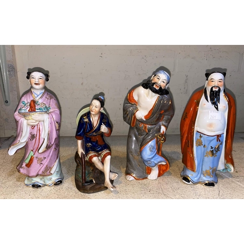 261 - Four 20th century Chinese porcelain figures in traditional dress, 3 male, 1 female, Largest figure h... 