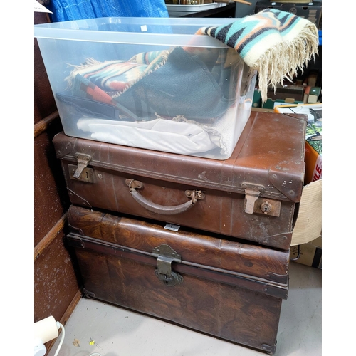 1 - A Victorian tin trunk, a Vulcanide fibre suitcase, a selection of 1930's hand woven wool fabric piec... 