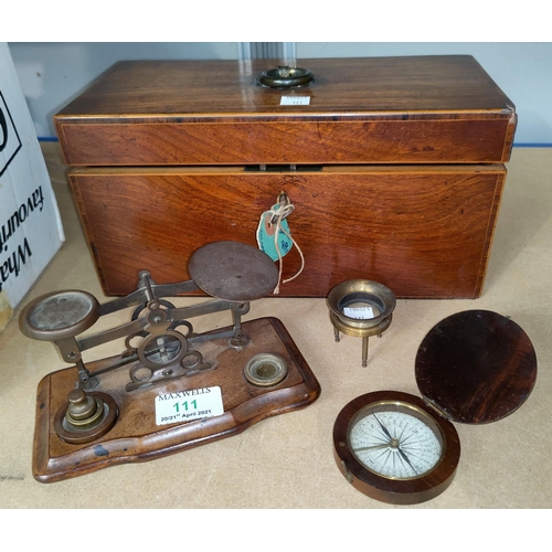 111 - A 19th century set of postage scales and weights; an adjustable brass lens on feet; a wooden cased c... 